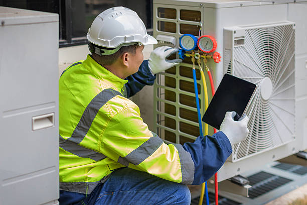 Professional Hvac technician working in Ferguson, MO